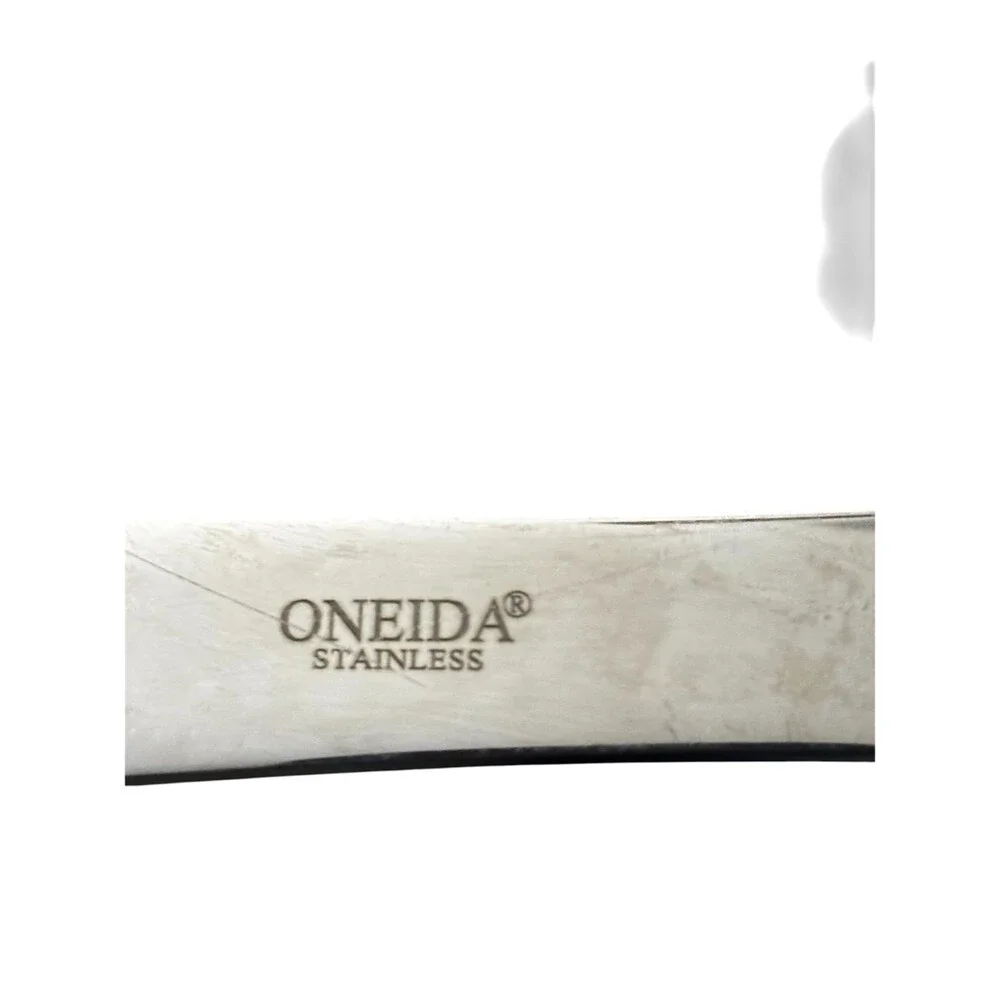 Oneida stainless steel turner spatula with a large, flexible black silicone head